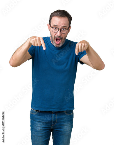 Handsome middle age hoary senior man wearin glasses over isolated background Pointing down with fingers showing advertisement, surprised face and open mouth photo