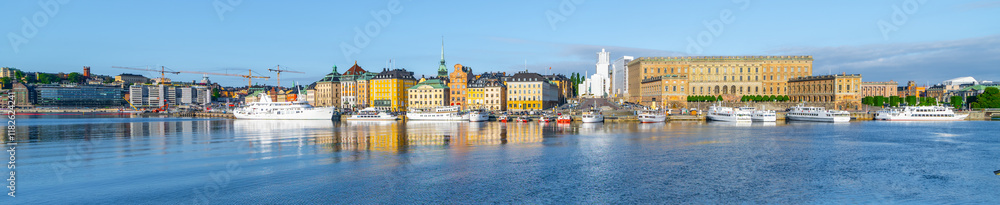 The Stockholm waterfront basks in the evening light, featuring the grandeur of the Royal Palace and the city reflection on the tranquil water. Stockholm, Sweden The Stockholm waterfront basks in the evening light, featuring the grandeur of the Royal Palace and the city reflection on the tranquil water. Stockholm, Sweden