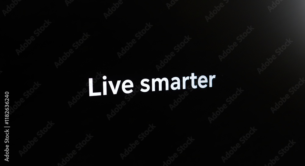 Minimalist 'Live Smarter' Slogan on Black Background - Ideal for Lifestyle and Advertising Themes. Minimalist 'Live Smarter' Slogan on Black Background - Ideal for Lifestyle and Advertising Themes.