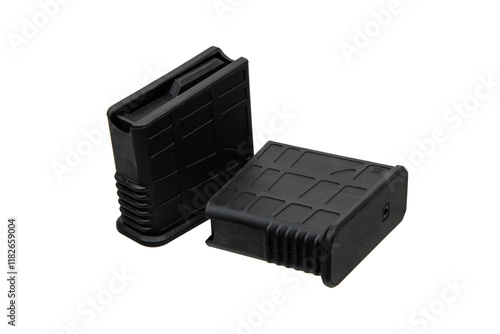 Two black plastic magazines for firearms, one standing upright and the other lying flat, isolated on a white back photo