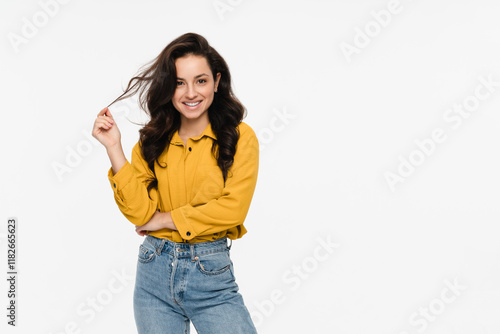 Portrait of positive cheerful girl woman student cross hand playing with hair wear good look outfit isolated over white color background. Empty space for advertisement photo