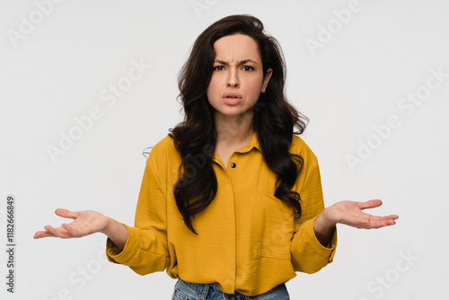 Canvas Print Portrait of hispanic latin questioned indecisive woman girl student with dark cu