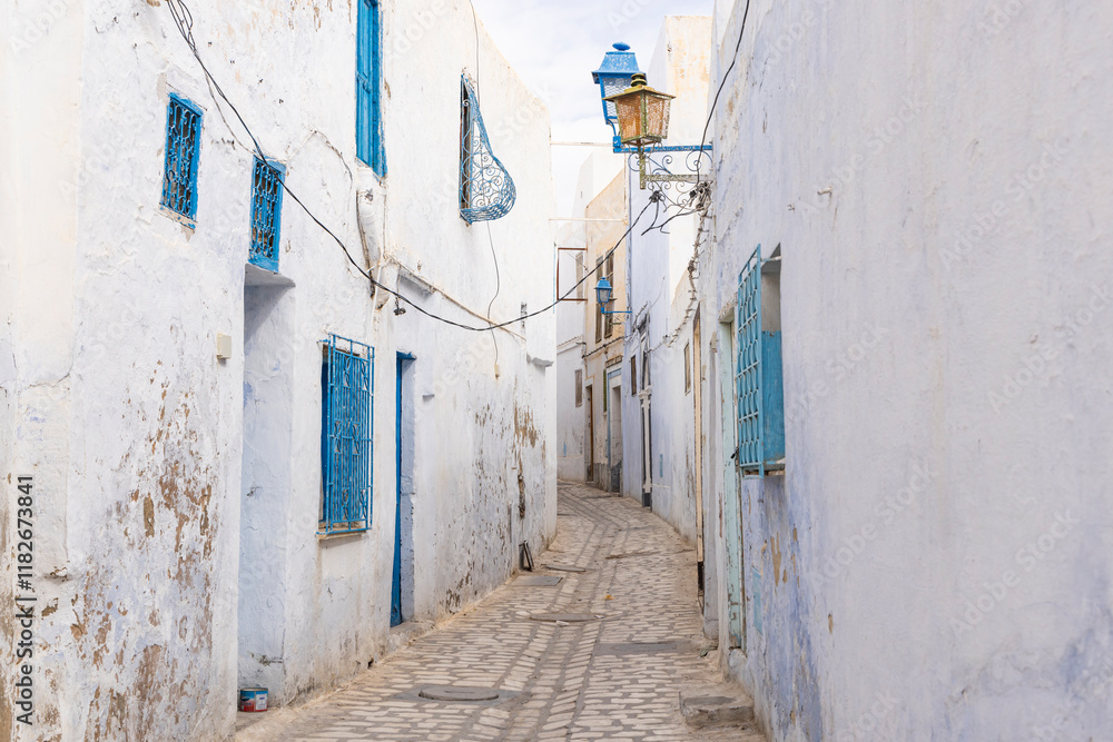 Kairouan, Tunisia. Narrow alley in the city of Kairouan. Kairouan, Tunisia. Narrow alley in the city of Kairouan.