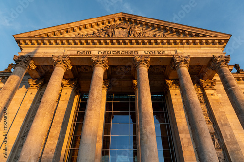 Front of the Reichstag building during the hours of sunset
