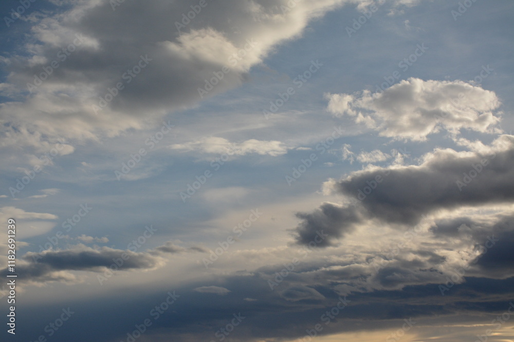 Gray clouds against blue sky