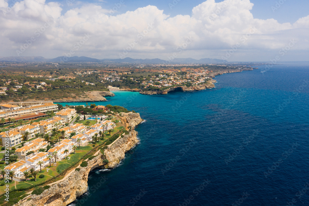 An aerial panoramic view on Cala Anguila shoreline on Mallorca island in the Mediterranean Sea An aerial panoramic view on Cala Anguila shoreline on Mallorca island in the Mediterranean Sea