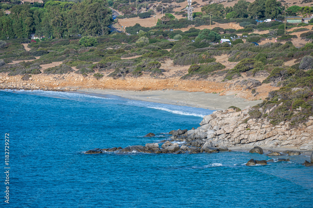 The beautiful beach of Porto Sa Ruxi in Sardinia with white sand and transparent blue and turquoise water