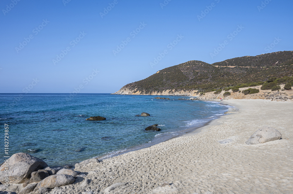 The beautiful beach of Porto Sa Ruxi in Sardinia with white sand and transparent blue and turquoise water