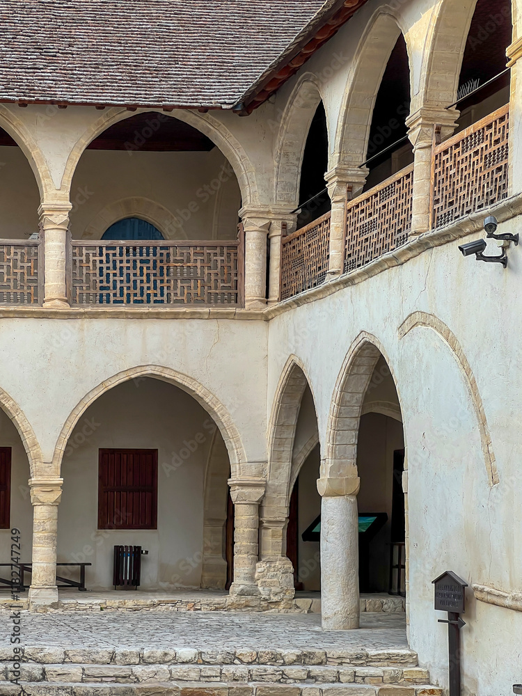 Naklejka premium The old town of Omodos in Cyprus with historic buildings, narrow streets with shops focused on selling regional souvenirs, arts and crafts