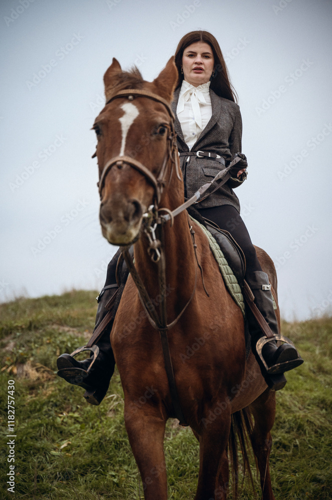 A person riding a horse in a field A person riding a horse in a field