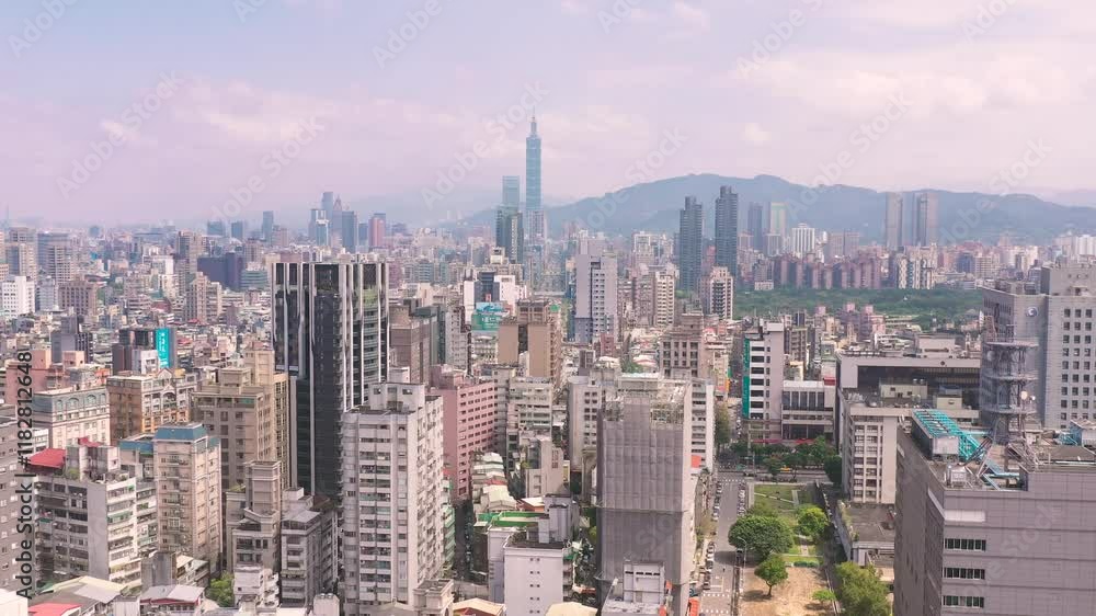 TAIWAN, CHINA - JANUARY 7, 2025: Overview of Taipei city skyline with modern buildings and mountains in the background under a clear sky TAIWAN, CHINA - JANUARY 7, 2025: Overview of Taipei city skyline with modern buildings and mountains in the background under a clear sky