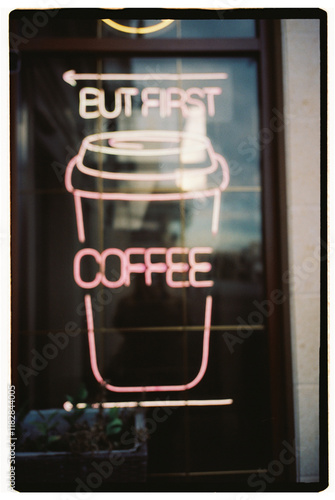 Neon Sign Saying ‘But First Coffee' photo