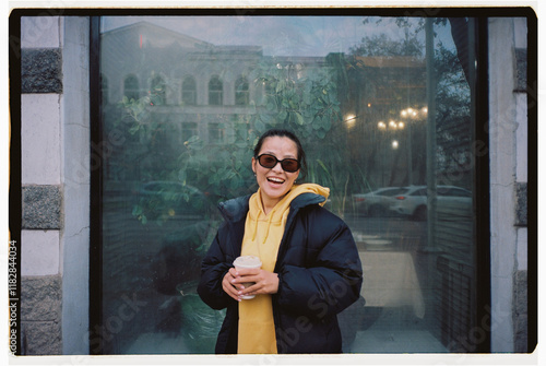 Portrait of a woman with a warm drink photo