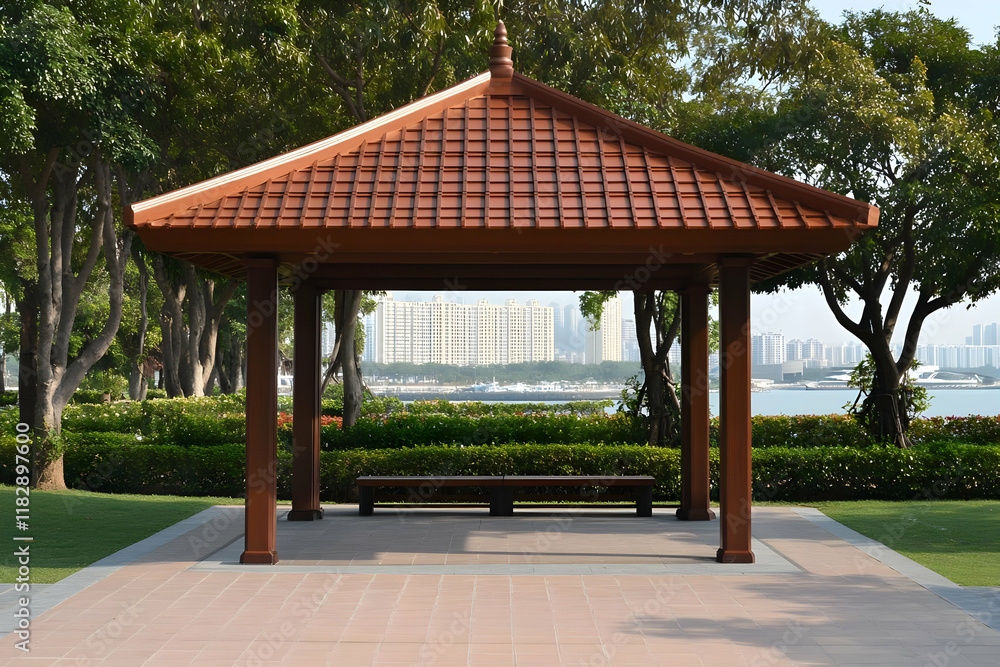 Wooden gazebo stands in a lush green park with a cityscape in the distance. Wooden gazebo stands in a lush green park with a cityscape in the distance.