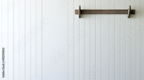 Obraz na płótnie soft gray cottage wall with vertical tongue and groove paneling and wooden coat rack. minimalist design creates calm and inviting atmosphere w salonie