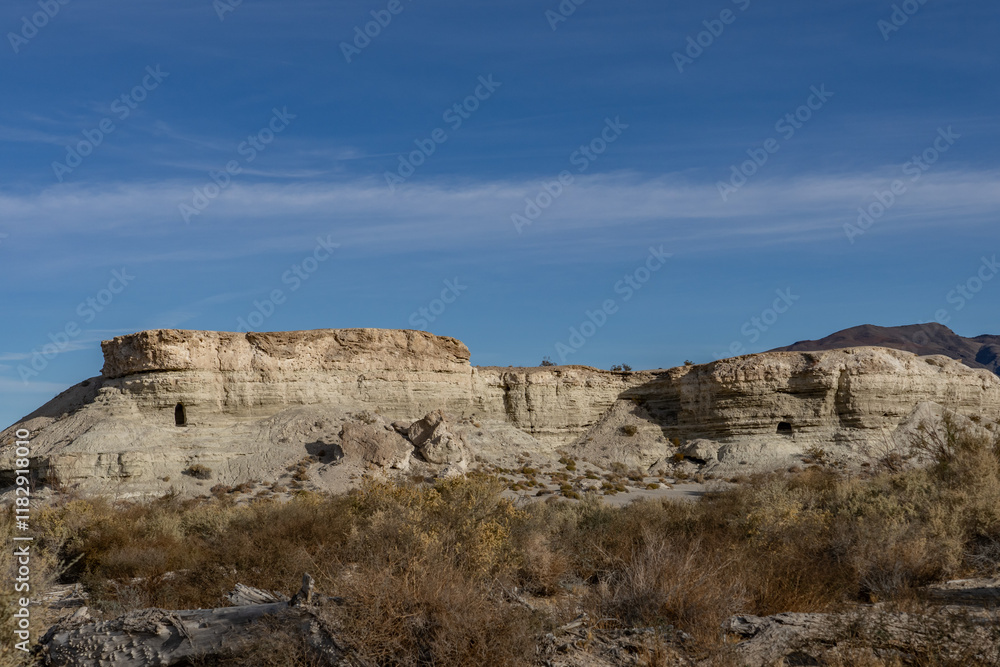 Fototapeta premium Lacustrine deposits are sedimentary rock formations which formed in the bottom of ancient lakes. Shoshone, Inyo County, California. Lake Tecopa is a former lake. Tecopa Lake Beds. Mojave Desert.