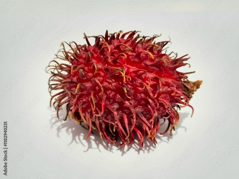 Naklejka premium Rambutan fruit isolated on a white background with clipping path and full depth of field