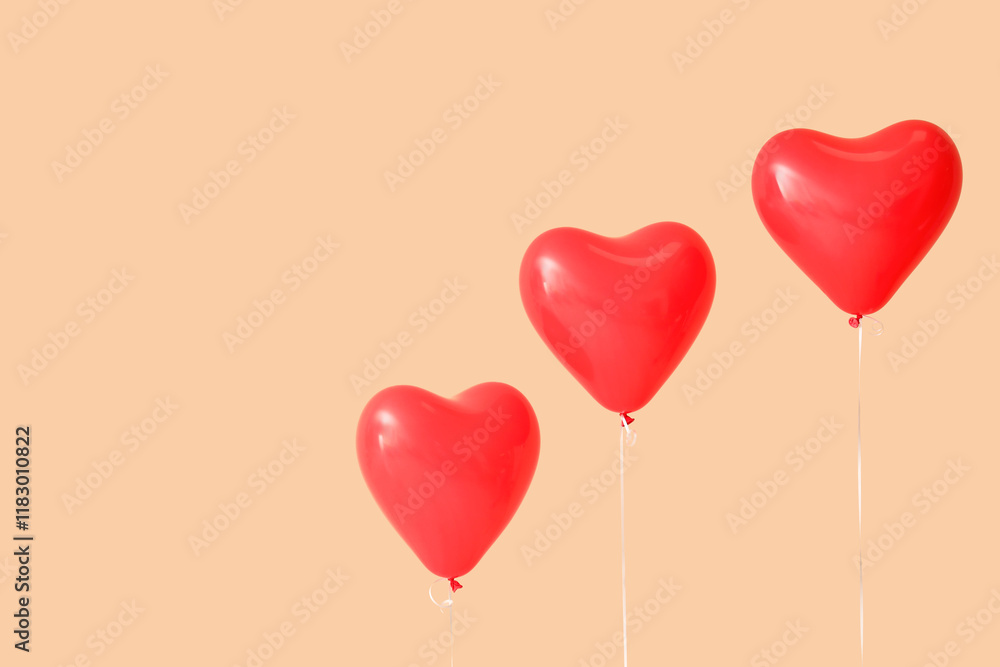 Heart-shaped balloons on beige background. Valentine's Day celebration Heart-shaped balloons on beige background. Valentine's Day celebration