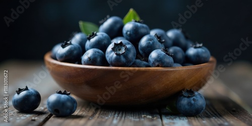 Wallpaper Mural A wooden bowl brimming with plump, juicy blueberries, ready to be enjoyed Torontodigital.ca