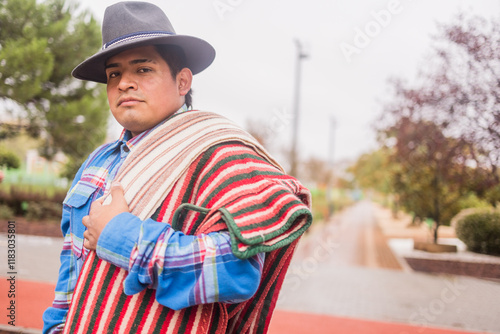 Ecuadorian chagra man wearing traditional clothes and hat celebrating independence dia hispanidad photo