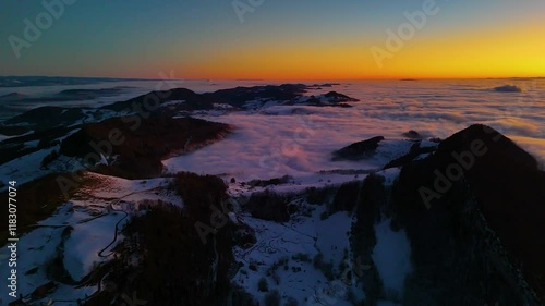 Beautiful cover of clouds over central Switzerland. View on the last sunrise of the year 2024.