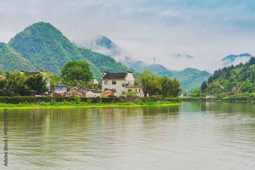 Fototapeta premium Tourism Scenery of Ancient Towns, Ancient Buildings, and Rivers in the Mountainous Areas of Anhui Province, China On April 22, 2024