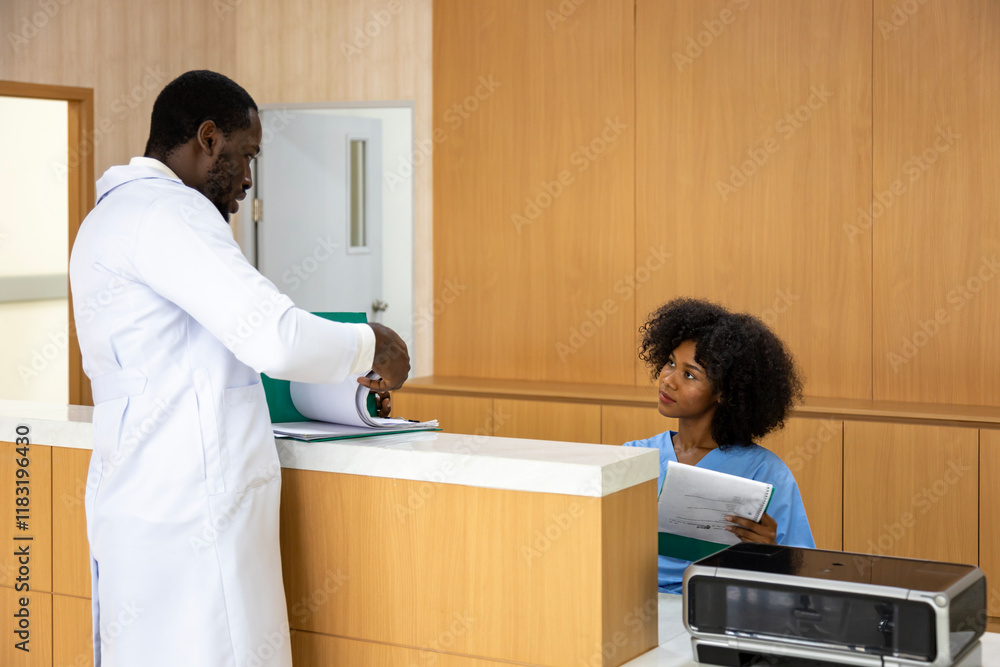 Team of African American doctor and nurse is discussing and brainstorming on patient medical record after diagnosis for precise care plan with experienced senior physician specialist Team of African American doctor and nurse is discussing and brainstorming on patient medical record after diagnosis for precise care plan with experienced senior physician specialist