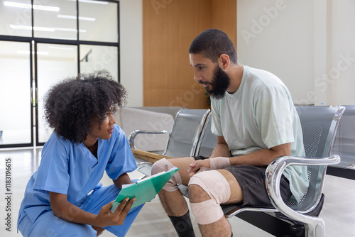 African nurse is examining tendinitis on knee injury from sport accident in Middle East patient for treatment and rehabilitation concept photo