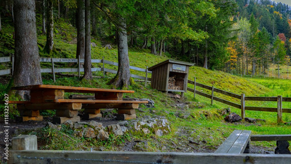 Rest area on a hiking trail in Swiss Alps. Rest area on a hiking trail in Swiss Alps.