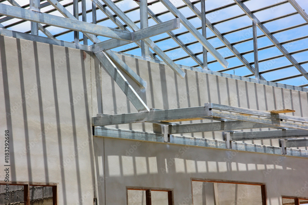 Obraz premium steel roof beam new house under constructed