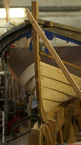 Wallpaper Mural Replanking clinker built Irish fishing boat Vertical shot Torontodigital.ca