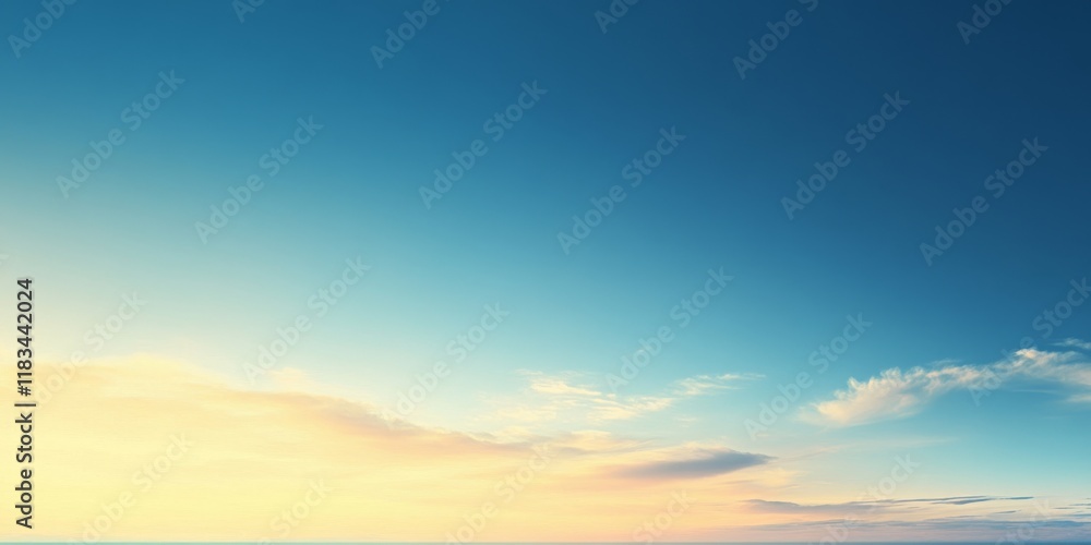 Fototapeta premium A gentle gradient sky that transitions softly between hues of blue and yellow creates a serene backdrop perfect for various artistic or design purposes.