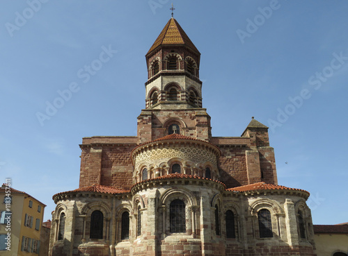 Romanesque Abbey of Saint-Austremoine. Issoire. Auvergne. France. 12th century. General view of the apses and the bell tower.  photo