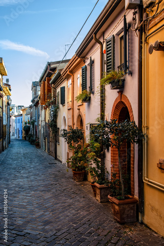 Early morning view to picturesque street Via Marecchia in Rimini, Italy. photo