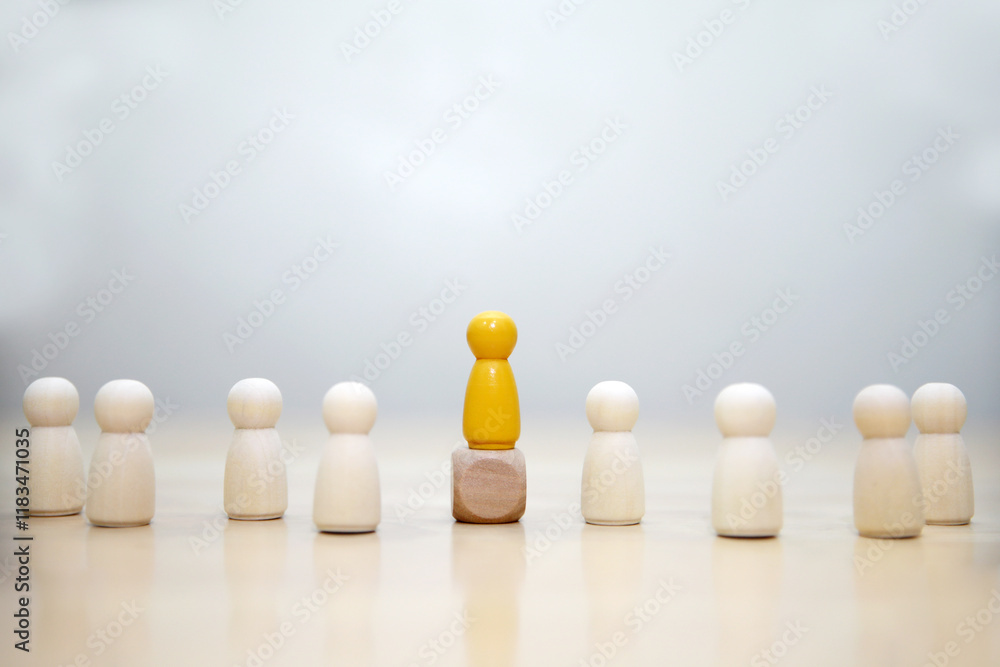 Wooden person model among people, Leadership concept.3D rendering on white background Wooden person model among people, Leadership concept.3D rendering on white background