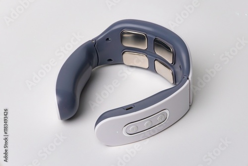 Foto Compact pulse electric smart neck massager on a white background