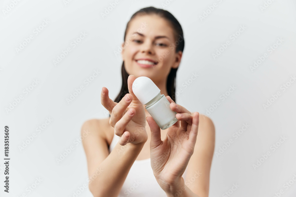 skincare, beauty, woman, cosmetics, personal care, deodorant, healthy lifestyle, wellness, hygiene, smiling, happy, holding product, white background, natural beauty, self care, confidence, clean skincare, beauty, woman, cosmetics, personal care, deodorant, healthy lifestyle, wellness, hygiene, smiling, happy, holding product, white background, natural beauty, self care, confidence, clean