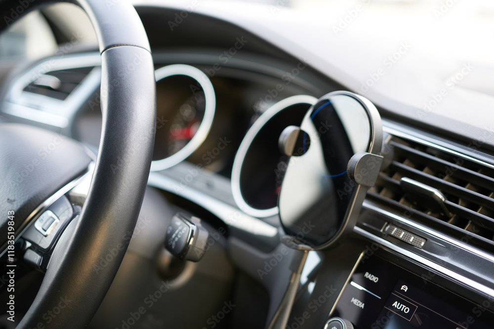 Modern car interior. Steering wheel and dashboard. Close up. Modern car interior. Steering wheel and dashboard. Close up.