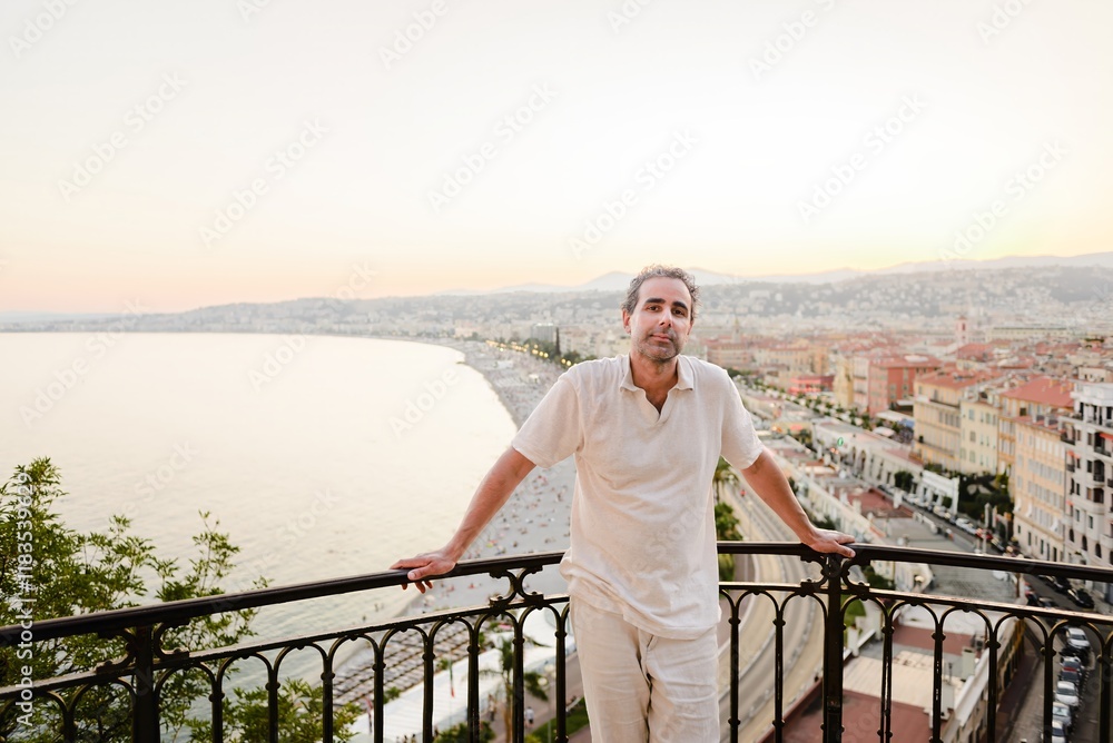 Man Posing at Scenic Sunset Viewpoint Over Nice, French Riviera Man Posing at Scenic Sunset Viewpoint Over Nice, French Riviera