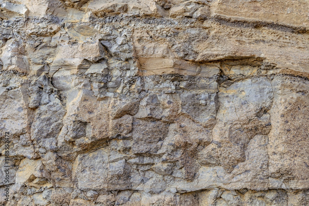 Close-up detailed shot of a natural stone texture with rugged details in Iceland