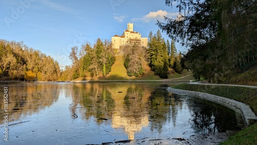 Obraz na płótnie Beautiful winter scenery of Trakošćan Castle on the hill by the lake in the forest at Croatia, county hrvatsko zagorje, nature background w salonie