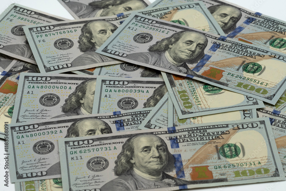 American dollar banknotes on a white background close-up. American dollar banknotes on a white background close-up.