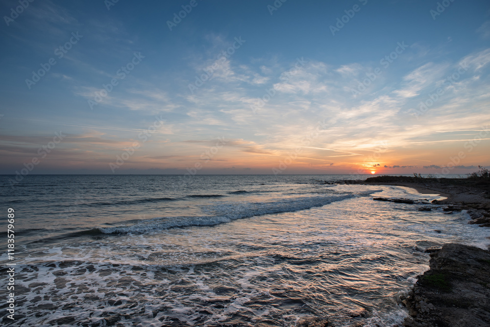 Fototapeta premium Sunset on the beach in Marina Di Ragusa in Sicily