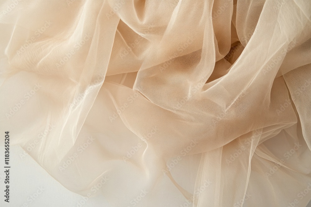 Fototapeta premium Soft, flowing fabric showcases delicate textures and warm, neutr