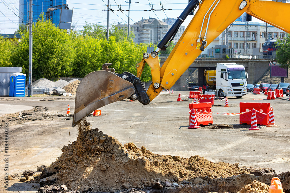 Heavy machinery at work transforming an urban construction site into a new development space