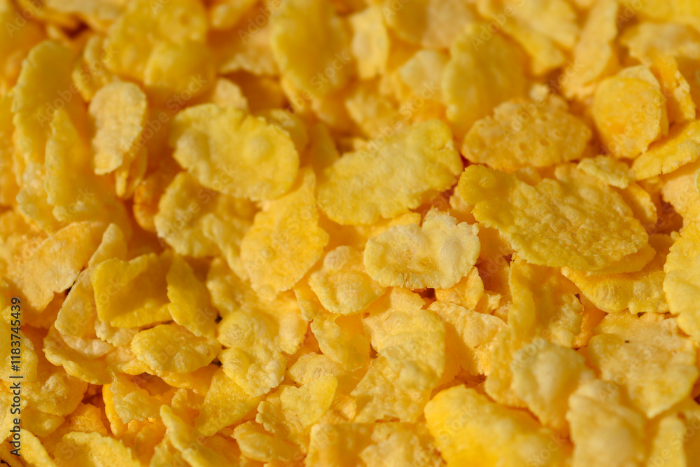 Close-up pile of crispy, golden-yellow cornflakes Close-up pile of crispy, golden-yellow cornflakes