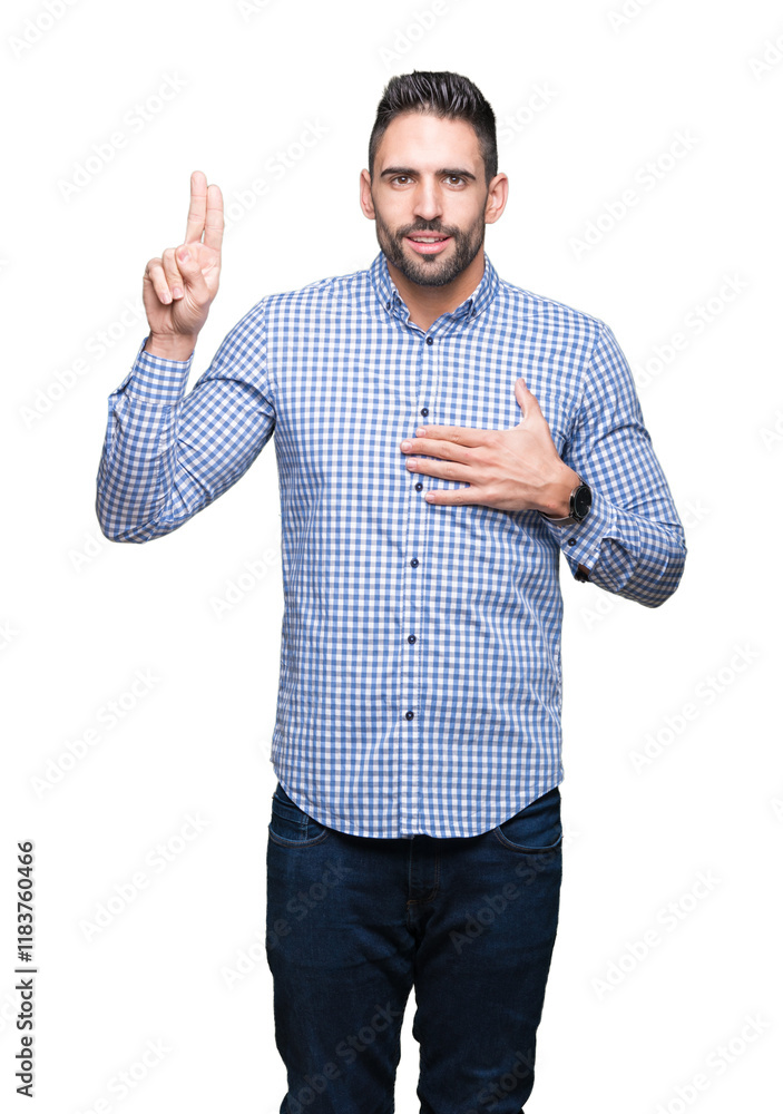 Young handsome man over isolated background Swearing with hand on chest and fingers, making a loyalty promise oath Young handsome man over isolated background Swearing with hand on chest and fingers, making a loyalty promise oath