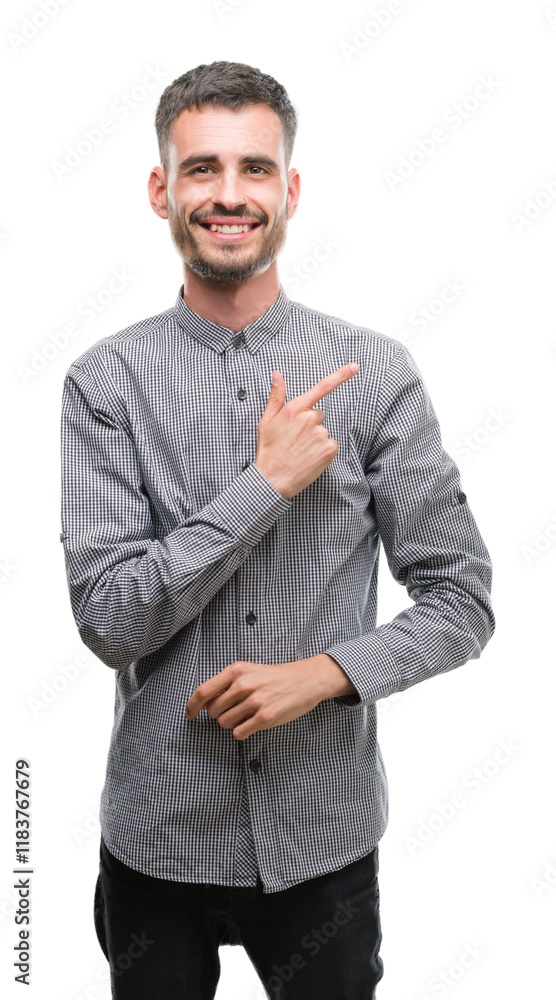 Φωτογραφία Young hipster man cheerful with a smile of face pointing with hand and finger up to the side with happy and natural expression on face looking at the camera