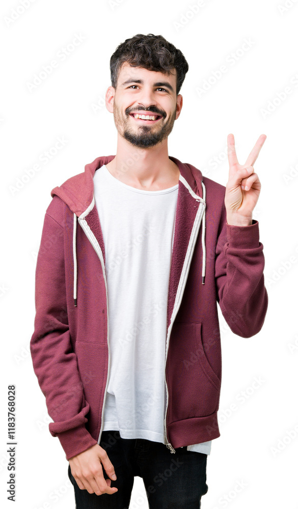 Fototapeta premium Young handsome man over isolated background smiling with happy face winking at the camera doing victory sign. Number two.