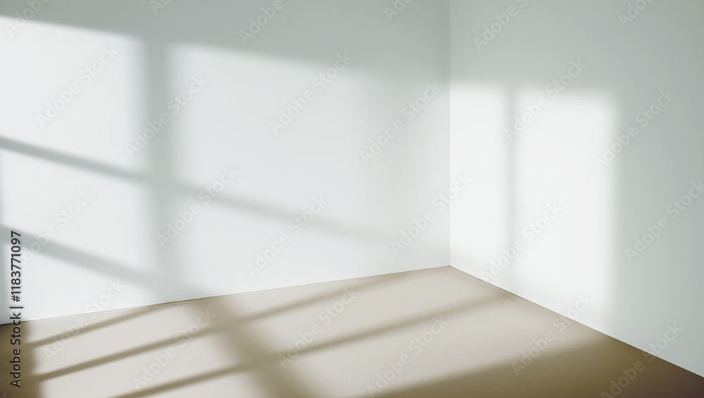 Sunlight from the window shines on the empty room walls and floor Sunlight from the window shines on the empty room walls and floor